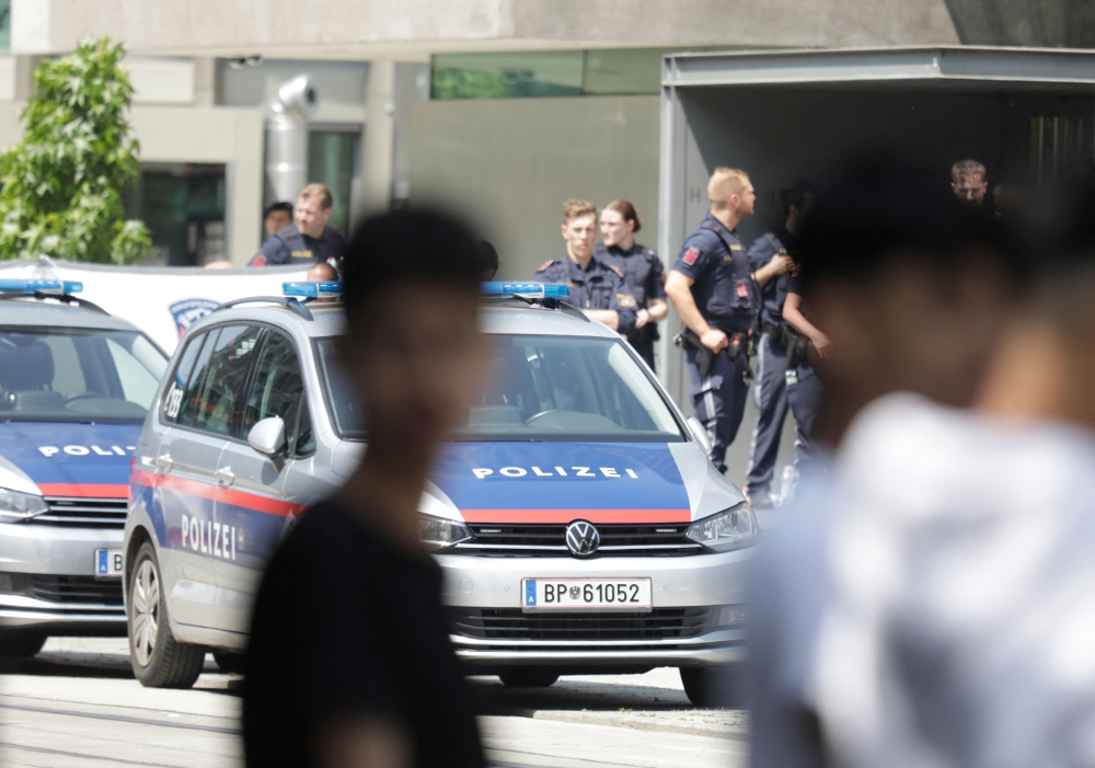 Police stand near a school where several people died in a shooting, on June 10, 2025 in Graz, southeastern Austria. (Photo by Alex Halada / AFP)