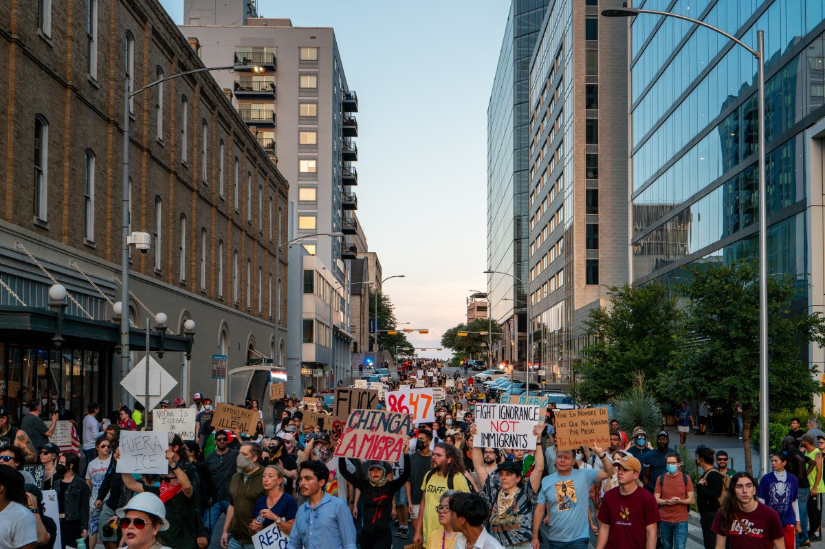 People march through downtown during an 