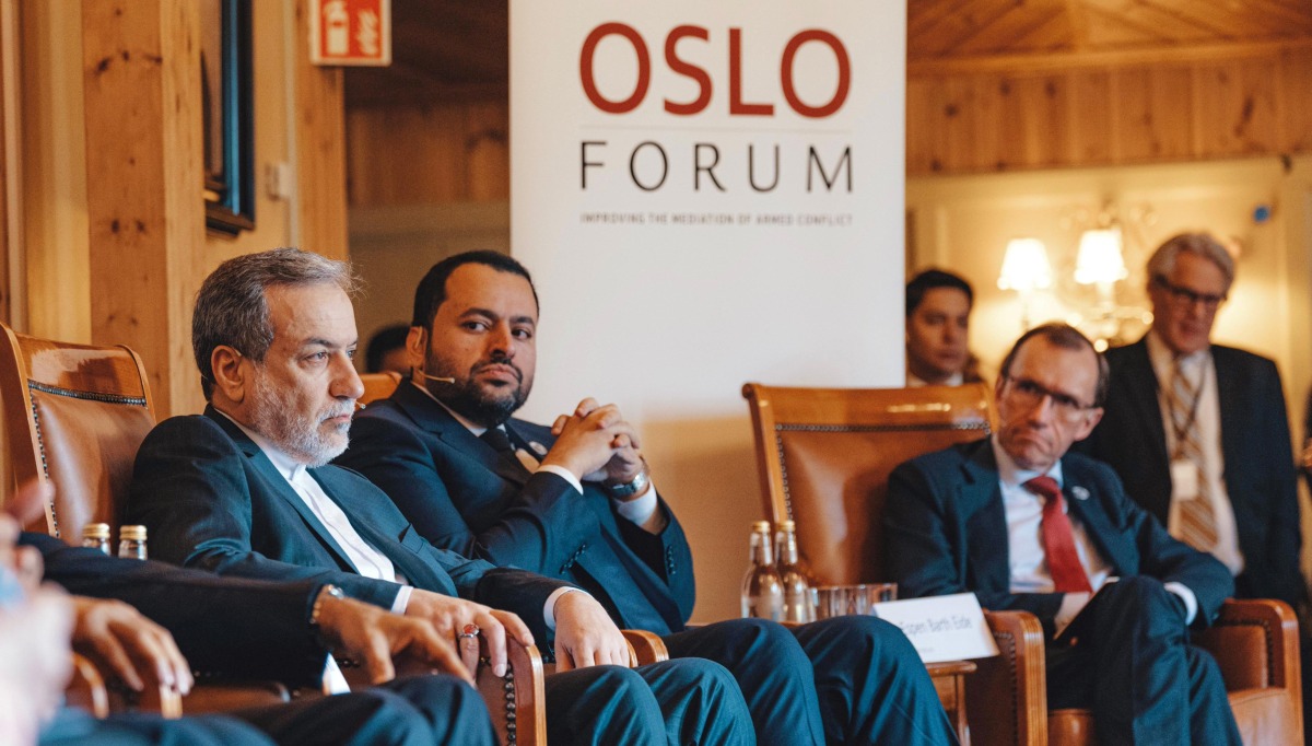 Minister of State at the Ministry of Foreign Affairs H E Dr. Mohammed bin Abdulaziz bin Saleh Al Khulaifi, Iran's Foreign Minister H E Abbas Araghchi (left) and others at a session at Oslo Forum. 