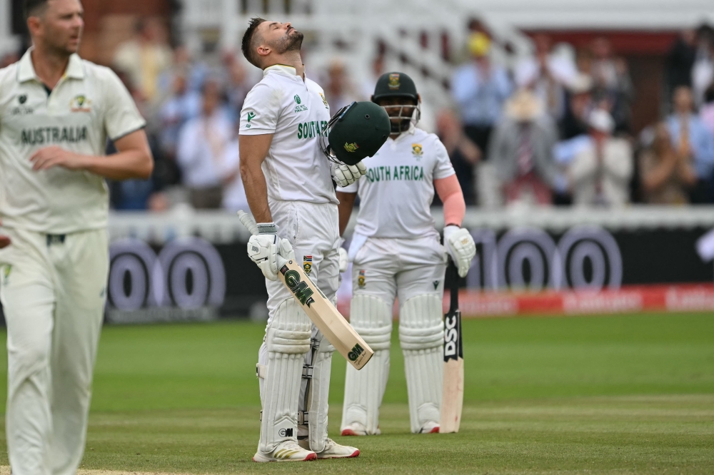 South Africa's Aiden Markram reacts after reaching his century on day three of the ICC World Test Championship cricket final in London, on June 13, 2025. (Photo by Glyn Kirk / AFP) 