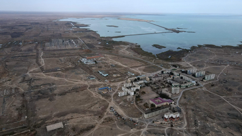 (Files) An aerial view shows the village of Ulken (foreground) and the proposed nuclear power plant site near in the village of Ulken, on September 22, 2024. (Photo by Ruslan Pryanikov / AFP)