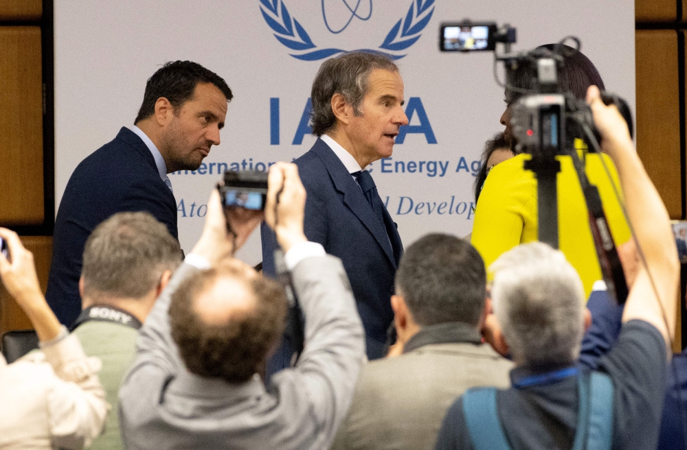 Rafael Grossi (C), Director General of the International Atomic Energy Agency (IAEA), arrives for the IAEA's Board of Governors meeting at the agency's headquarters in Vienna, Austria on June 16, 2025. (Photo by Joe Klamar / AFP)