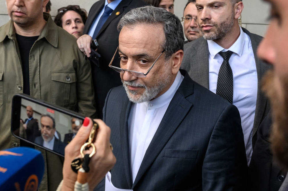 Iran's Foreign Minister Abbas Araghchi leaves after a meeting on Tehran's nuclear programme in Geneva on June 20, 2025. (Photo by Fabrice Coffrini / AFP)