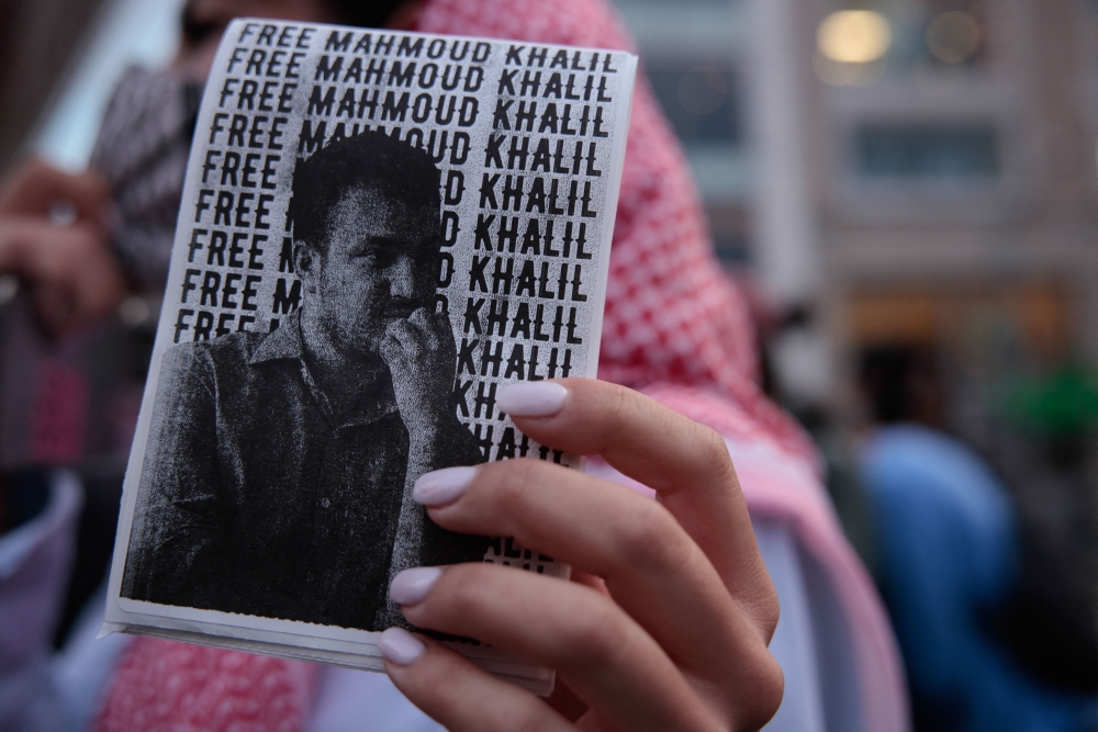(Files) A pro-Palestinian demonstrator holds a 