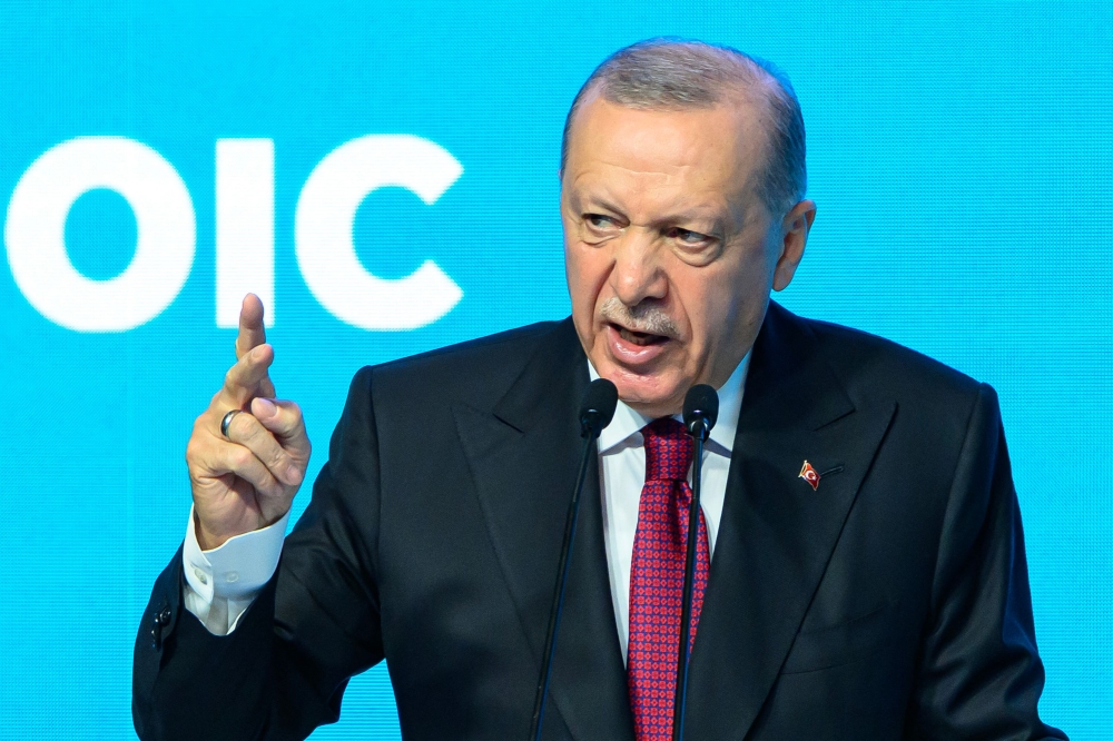 Turkey's President Recep Tayyip Erdogan speaks during the 51st session of the Council of Foreign Ministers of the Organization of Islamic Cooperation (OIC) in Istanbul, on June 21, 2025. (Photo by Yasin AKGUL / AFP)