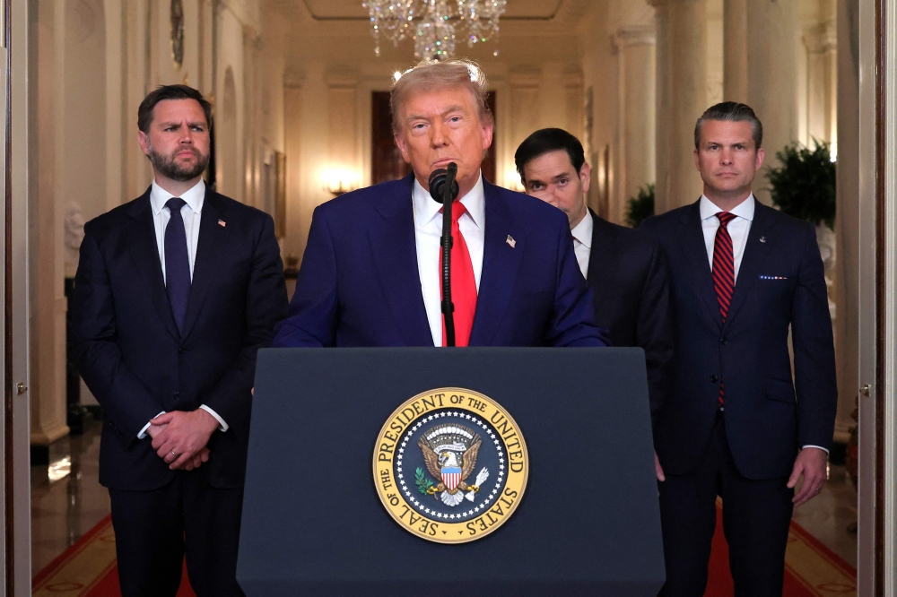US President Donald Trump addresses the nation, alongside US Vice President JD Vance (L), US Secretary of State Marco Rubio (2nd R) and US Secretary of Defense Pete Hegseth (R), from the White House in Washington, DC on June 21, 2025. (Photo by Carlos Barria / Pool/ AFP)