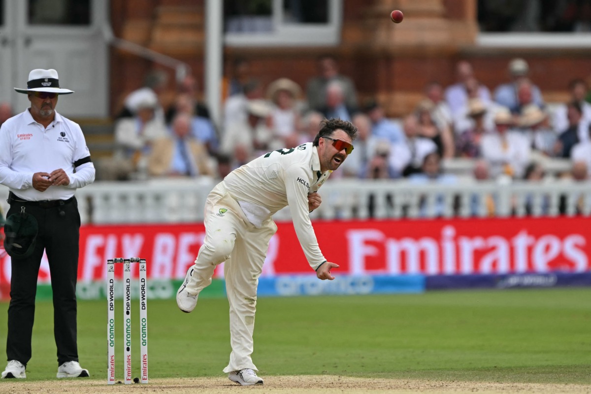 Australia's Travis Head bowls on day three of the ICC World Test Championship cricket final match between Australia and South Africa, at Lord's cricket ground, in London, on June 13, 2025. Photo by Glyn KIRK / AFP.