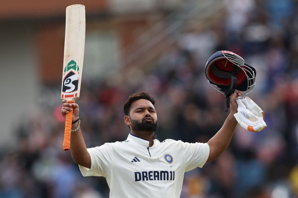 India's Rishabh Pant reacts as he walks back to the pavilion having lost his wicket for 118 on day four of the first cricket test match between England and India on June 23, 2025. (Photo by Darren Staples / AFP) 