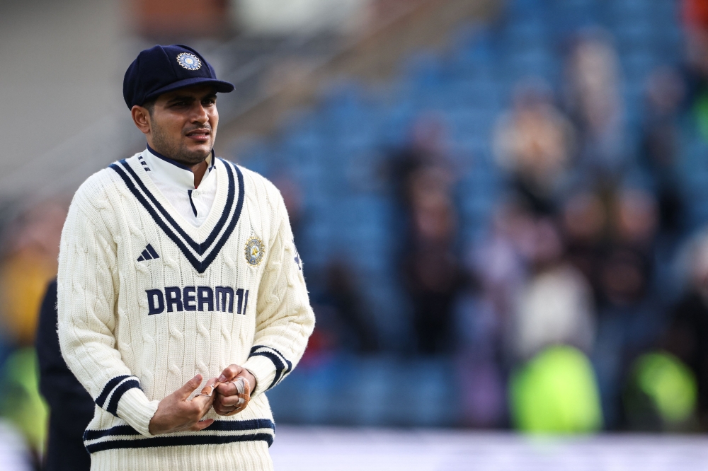 India's captain Shubman Gill reacts after his team defeat on day five of the first cricket test match between England and India at Headingley cricket ground in Leeds, northern England on June 24, 2025. (Photo by Darren Staples / AFP)  
