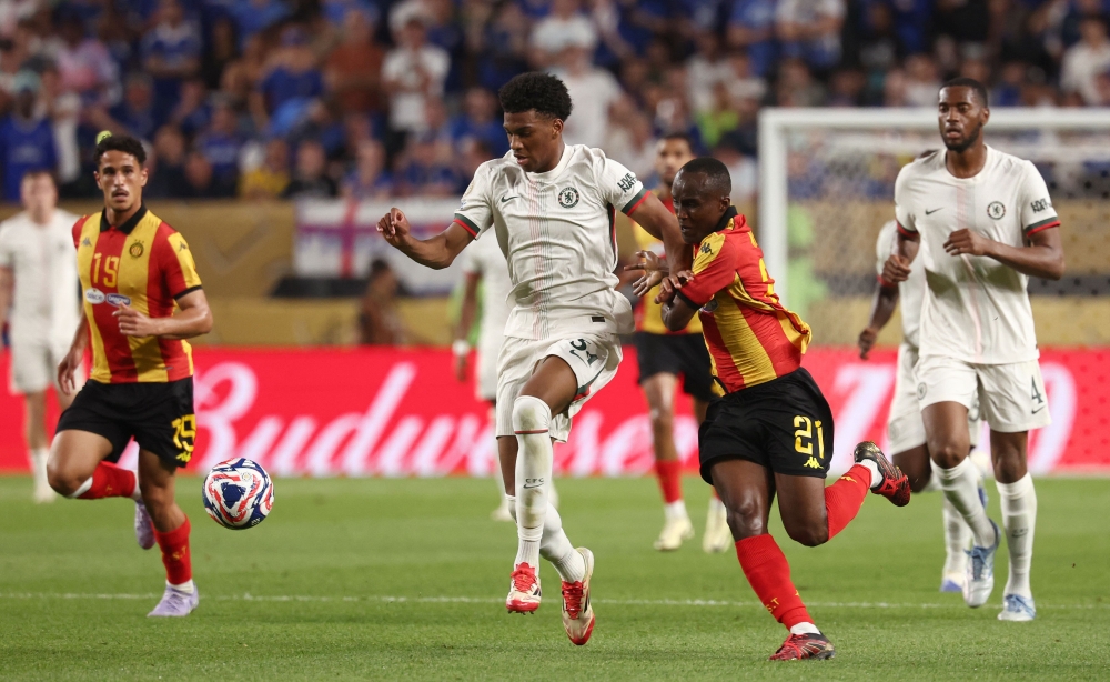 Chelsea's English defender #34 Josh Acheampong and Esperance's Ivory Coast midfielder #21 Abdramane Konate fight for the ball at the Lincoln Financial Field stadium in Philadelphia on June 24, 2025. (Photo by Franck Fife / AFP)