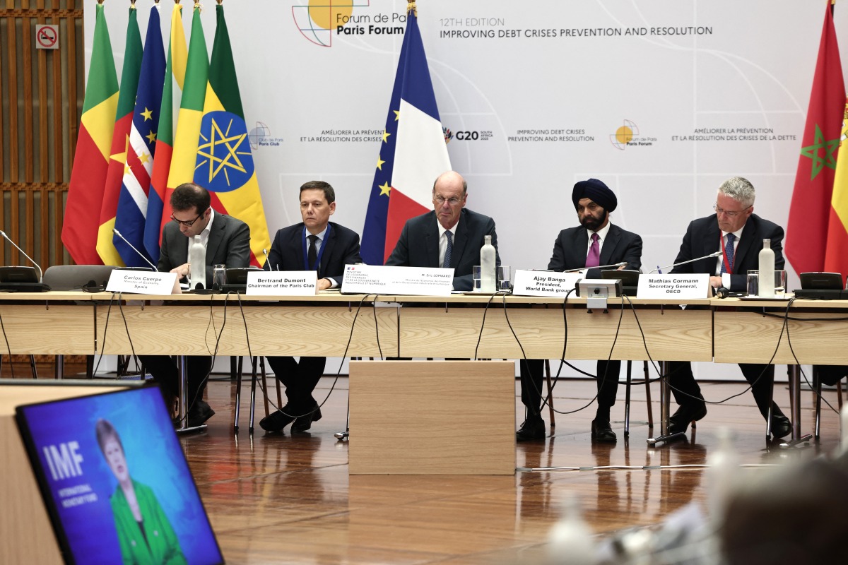 photo used for representational purposes. (From L) Spain's Minister of Economy, Trade and Business Carlos Cuerpo, Chairman of the Paris Club Bertrand Dumont, France's Minister for Economy, Finances and Industrial and Digital sovereignty Eric Lombard, President of the World Bank Group Ajay Banga and OECD Secretary General Mathias Cormann attend a debate as part of the 12th Paris Forum, at the French ministry of Economy in Paris on June 25, 2025. (Photo by Thibaud MORITZ / AFP)