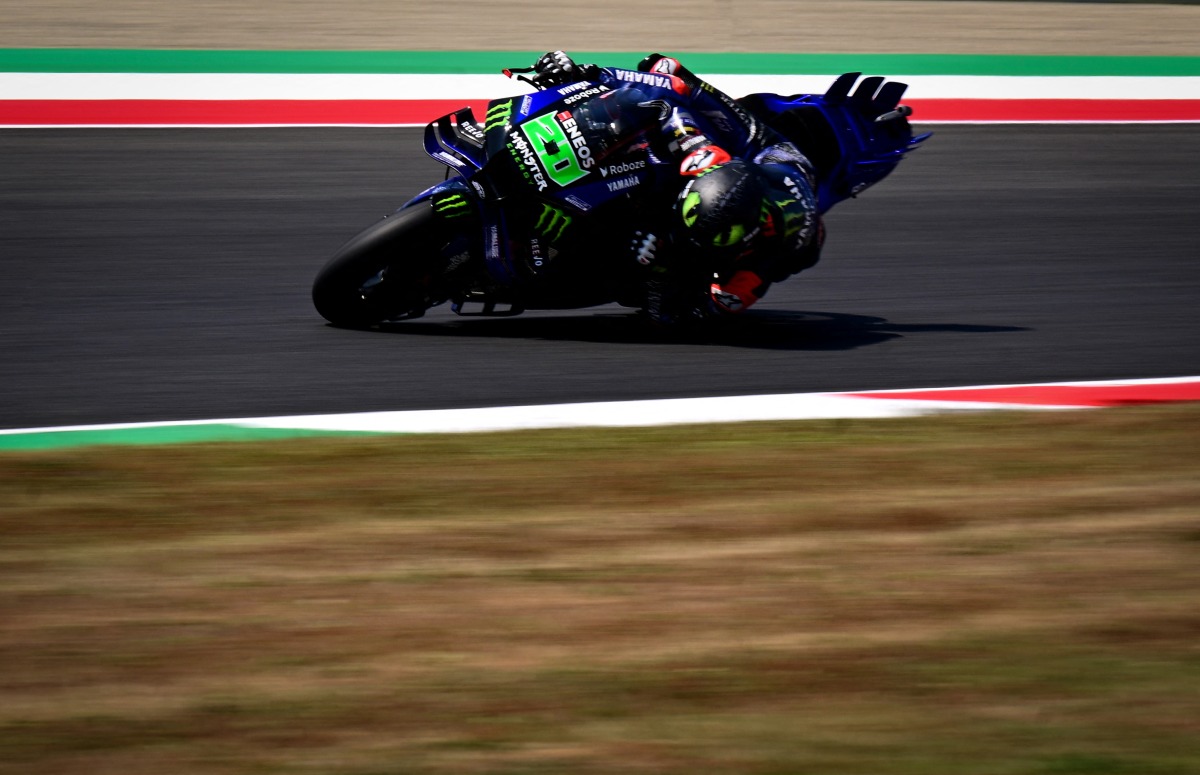 Monster Energy Yamaha MotoGP team's French MotoGP rider Fabio Quartararo steers his motorbike during the free practice sessions on the eve of the Italian Moto GP Grand Prix at Mugello circuit, in Mugello, near Florence, on June 21, 2025. (Photo by Tiziana Fabi / AFP)
