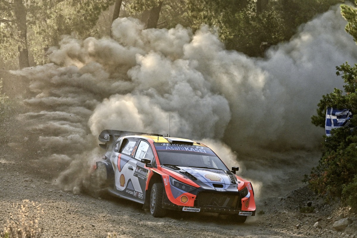Estonia's Ott Tanak and his co-driver Martin Jarveoja driver their Hyundai i20 N Rally1 at the special stage Agioi Theodoroi during the Acropolis Rally in Agioi Theodoroi on June 27, 2025. (Photo by Valerie GACHE / AFP)
