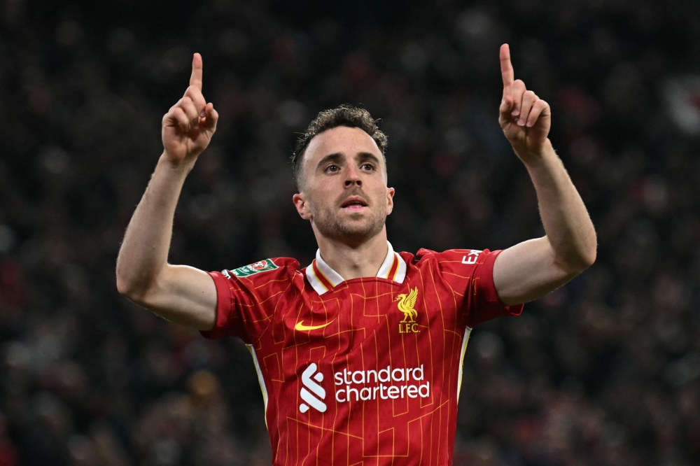 (Files) Liverpool's Portuguese striker #20 Diogo Jota on September 25, 2024. (Photo by Paul Ellis / AFP)