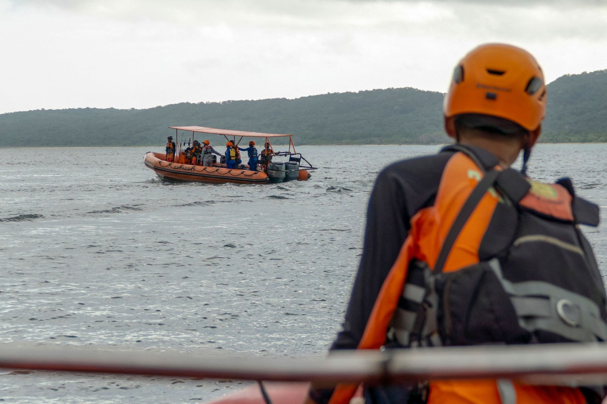 Rescuers search for missing victims of a ferry accident in the waters off the Bali Strait in Jembrana, Bali, on July 4, 2025. Photo by Dicky Bisinglasi / AFP