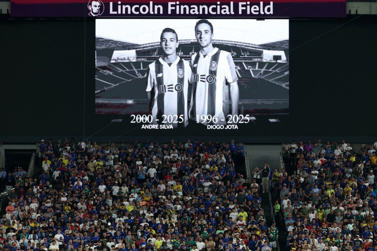 A view of a screen with an image of Liverpool's Portuguese forward Diogo Jota and his brother Andre Silva, who passed away after a car crash, ahead of the FIFA Club World Cup 2025 quarterfinal football match between Brazil's Palmeiras and England's Chelsea at the Lincoln Financial Field Stadium in Philadelphia on July 4, 2025. (Photo by FRANCK FIFE / AFP)
