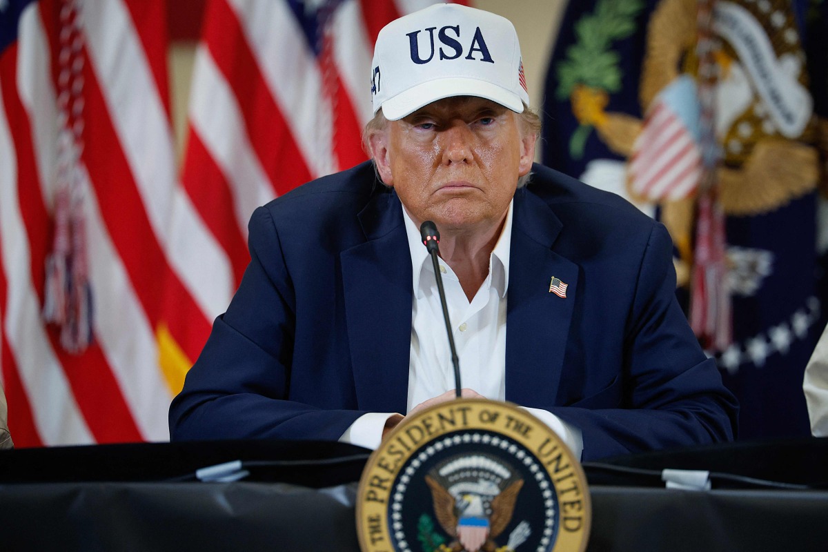 President Donald Trump participates in a round table event at the Hill Country Youth Event Center to discuss last week's flash flooding on July 11, 2025 in Kerrville, Texas. (Photo by CHIP SOMODEVILLA / GETTY IMAGES NORTH AMERICA / Getty Images via AFP)
