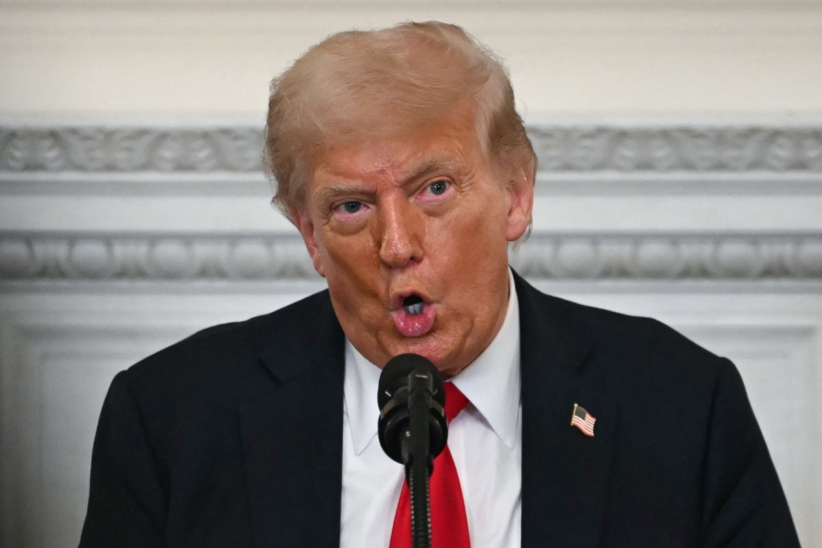 US President Donald Trump speaks during a White House Faith Office luncheon in the State Dining Room of the White House, in Washington, DC on July 14, 2025. (Photo by ANDREW CABALLERO-REYNOLDS / AFP)