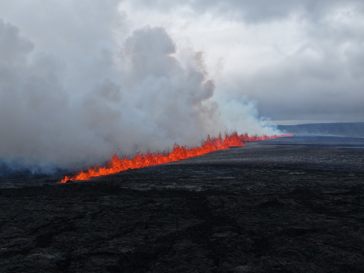 Handout picture released on July 16, 2025 by the Public Defense Department of the State Police Commissioner in Iceland shows lava and smoke erupting from a volcano near Grindavik on the Icelandic peninsula of Reykjanes. Photo by Handout / Public Defense Department of the State Police / AFP