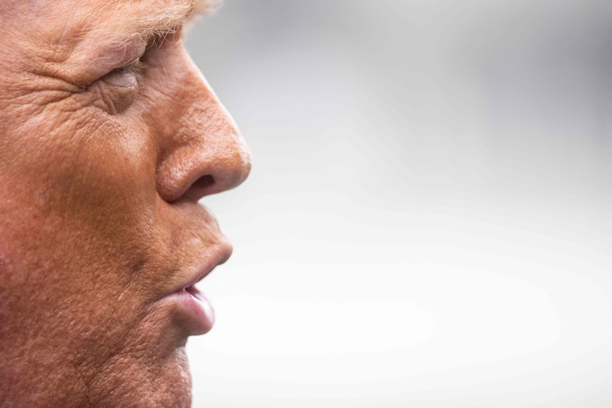 US President Donald Trump before boarding Marine One on the South Lawn of the White House on July 15, 2025, in Washington, DC. Photo by Jim WATSON / AFP