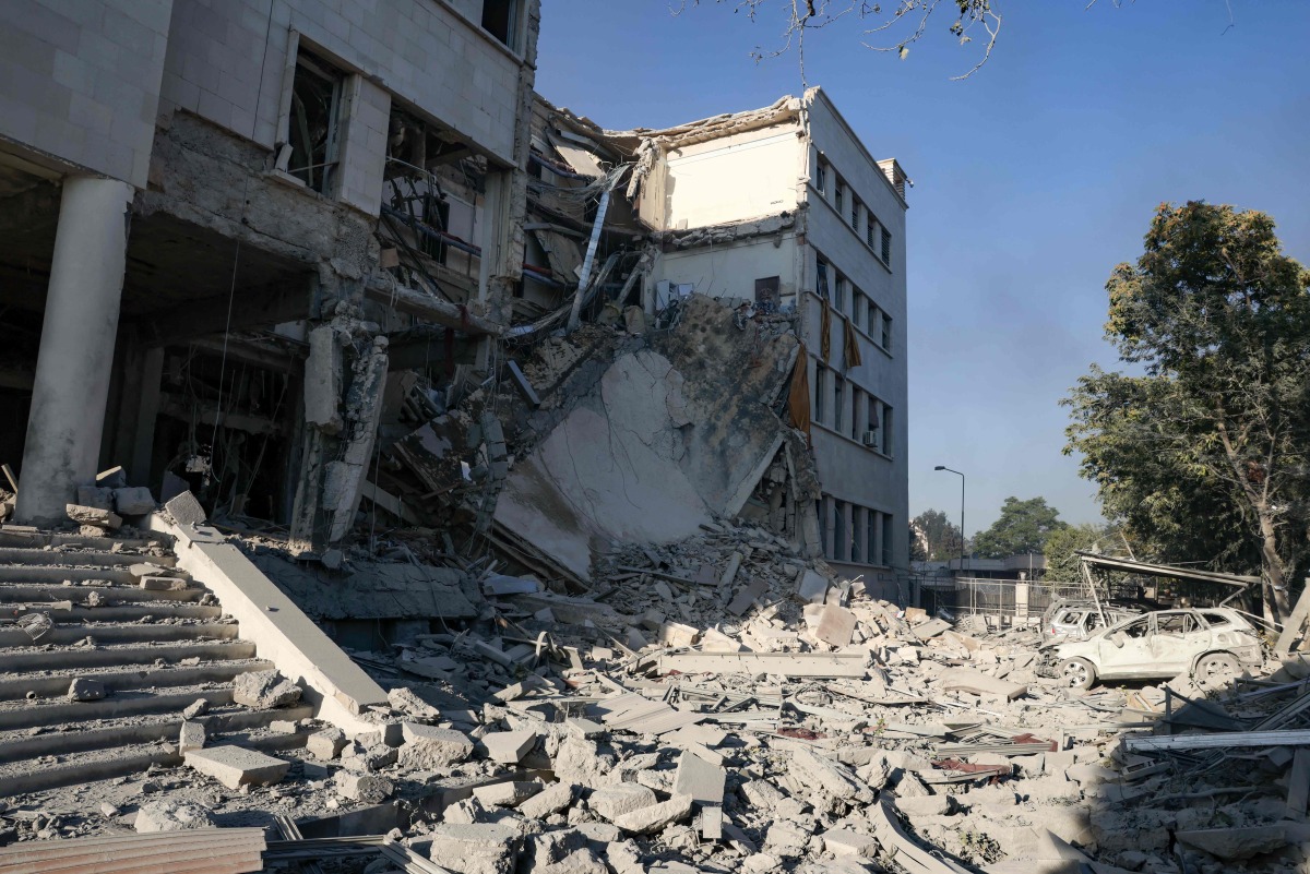 Rubble lies inside the heavily damaged Syrian army and defence ministry headquarters compled in Damascus, following Israeli strikes on July 16, 2025. (Photo by Bakr ALkasem / AFP)

