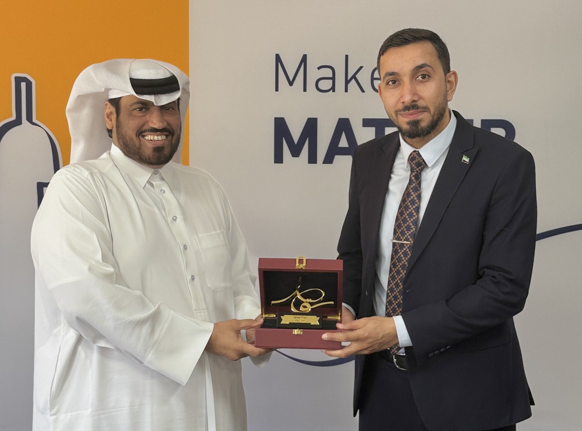 Acting Director General of Qatar Post Hamad AlFahaida (left) with Director General of the Syrian Post Emad Alden Hamad. 
