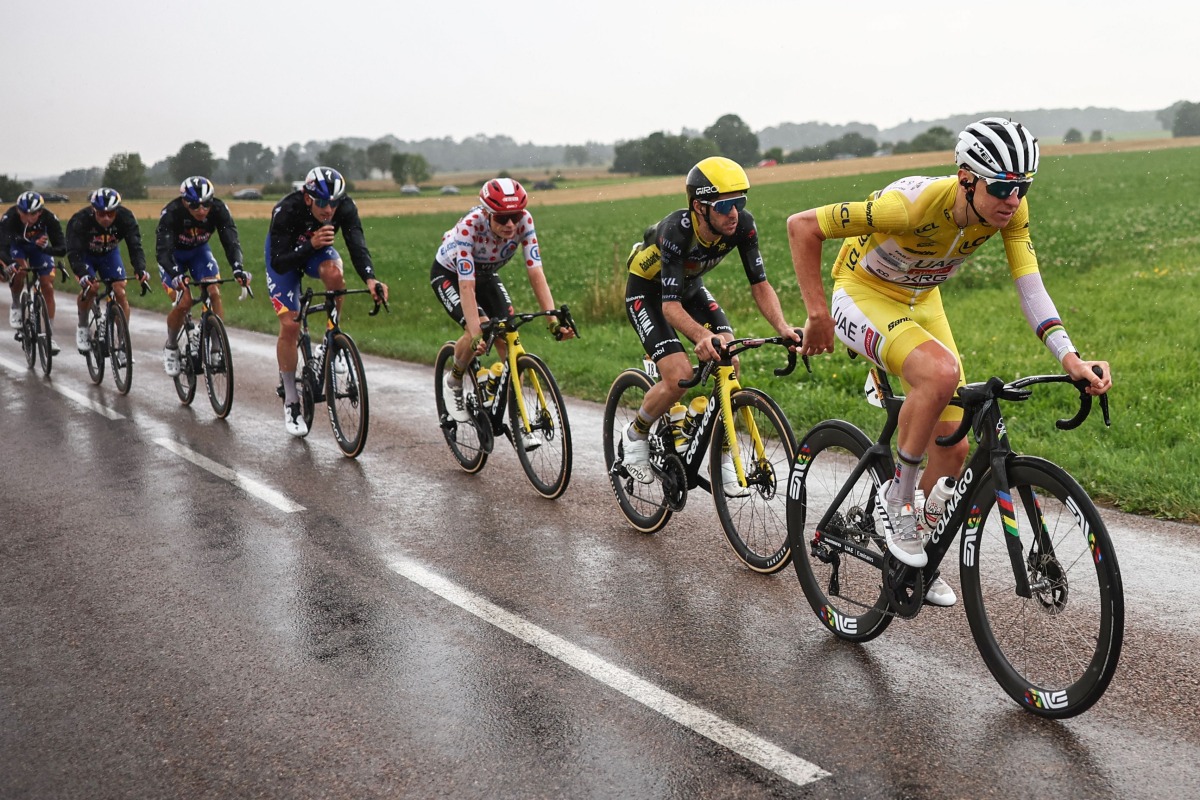 UAE Team Emirates - XRG team’s Slovenian rider Tadej Pogacar (right) leads the pack during the 20th stage.
