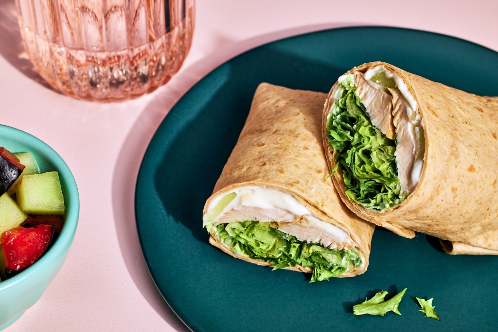 Chicken wraps with honeydew and goat Cheese. (Photo by Justin Tsucalas/The Washington Post)