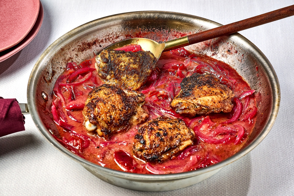 Skillet chicken thighs with plums. (Photo by Peggy Cormary; food styling by Lisa Cherkasky/The Washington Post)