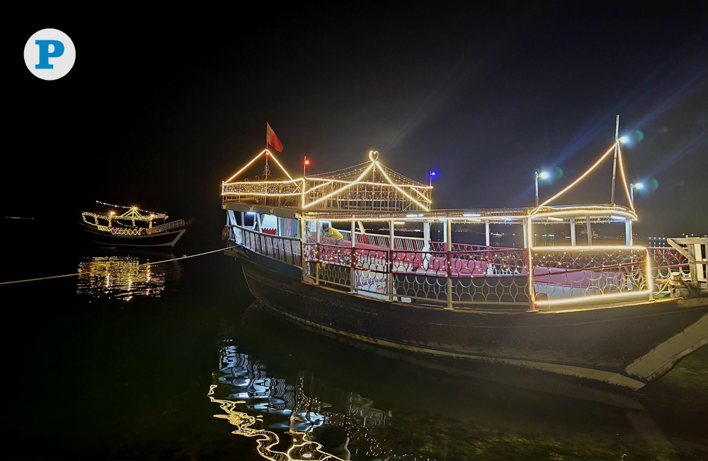 Decked-up traditional dhows along the Corniche attract residents despite humid nighttime conditions. Pic: Marivie Alabanza / The Peninsula