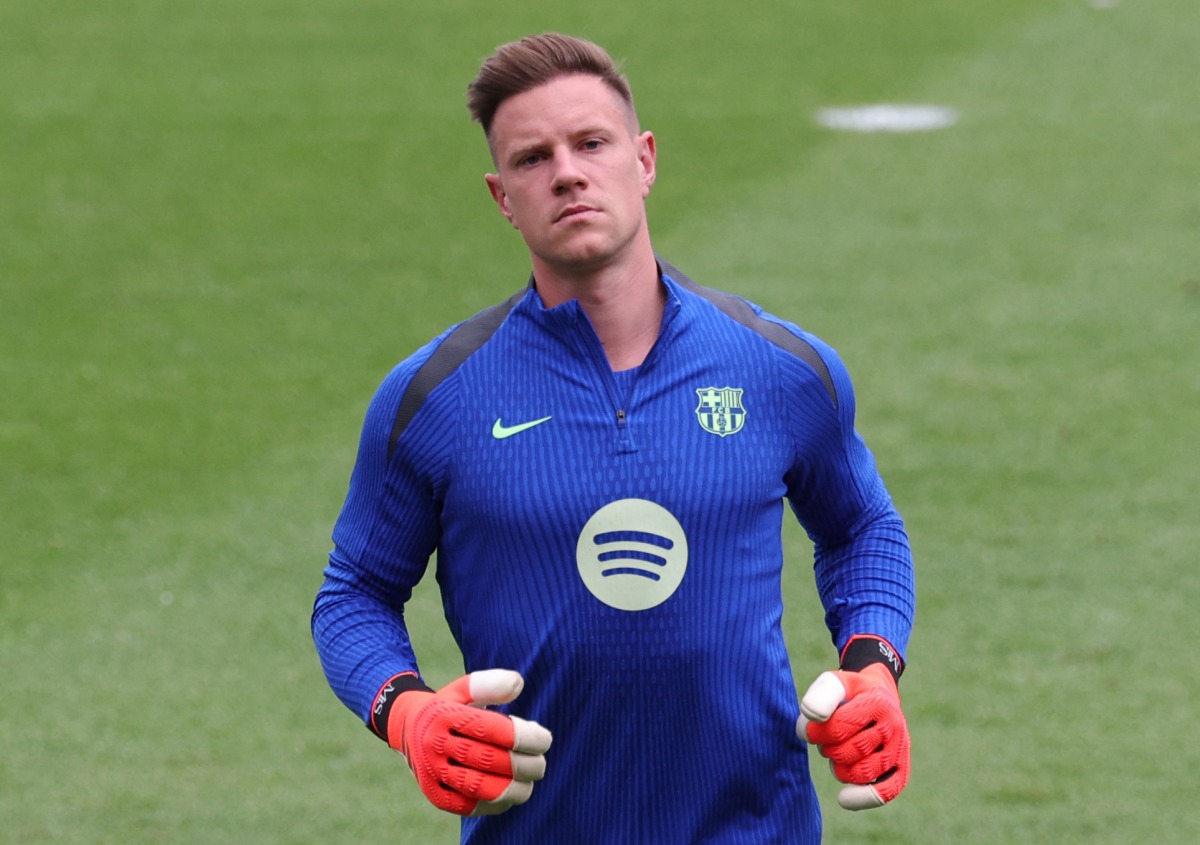 (FILES) Barcelona's German goalkeeper #01 Marc-Andre Ter Stegen takes part in a training session on the eve of the UEFA Champions League football match between AS Monaco and FC Barcelona at the Joan Gamper training ground in Sant Joan Despi, near Barcelona, on September 18, 2024. (Photo by LLUIS GENE / AFP)

