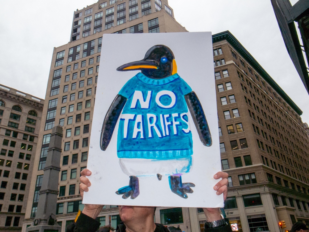 People protest President Donald Trump's tariffs in Manhattan on April 5, 2025. (Photo by John Taggart/For The Washington Post)