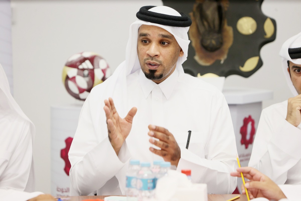 Director of Competitions at QSL Ahmed Salman Al Adsani speaks during the meeting.  