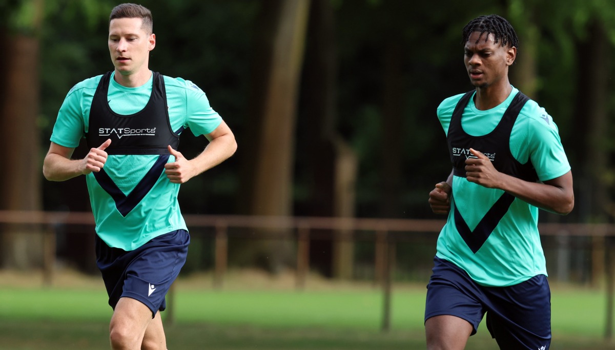 Al Ahli’s Julian Draxler (left) and Sekou Yansane attend a training session in this file photo. 
