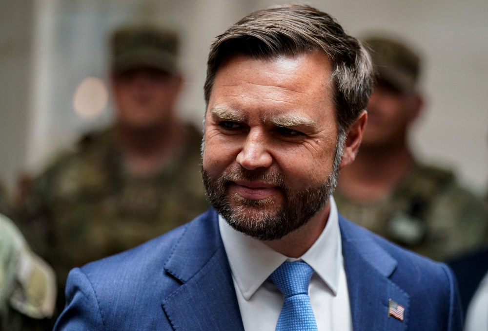 US Vice President JD Vance meets with members of the National Guard at Union Station in Washington, DC on August 20, 2025. (Photo by AL DRAGO / POOL / AFP)