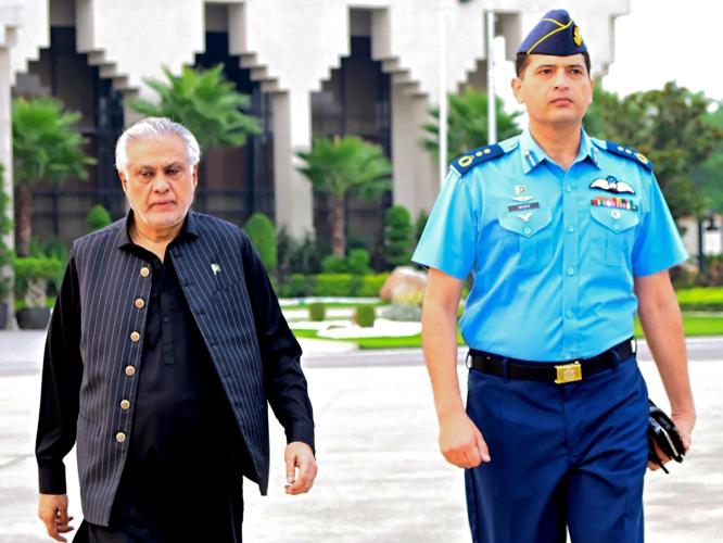 In this handout photograph taken and released by Pakistan's Ministry of Foreign Affairs on August 23, 2025, Pakistan's Foreign Minister Ishaq Dar (L) departs for Bangladesh. (Photo by HANDOUT / Pakistan's Ministry of Foreign Affairs / AFP) 