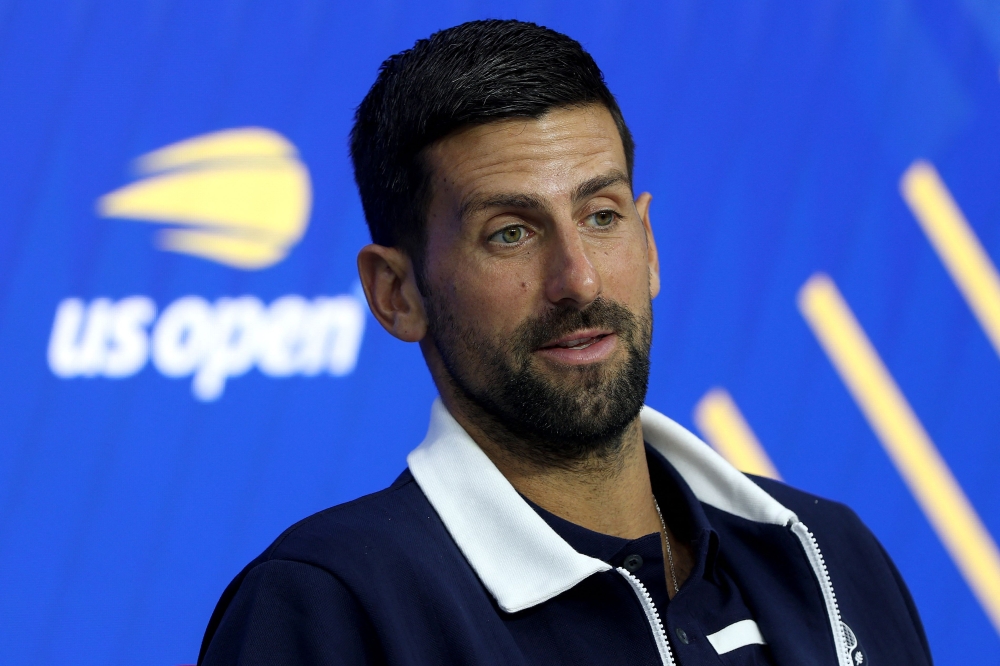 Novak Djokovic of Serbia fields questions during Media Day ahead of the US Open at USTA Billie Jean King National Tennis Center on August 20, 2025 in New York City. Matthew Stockman/Getty Images/AFP