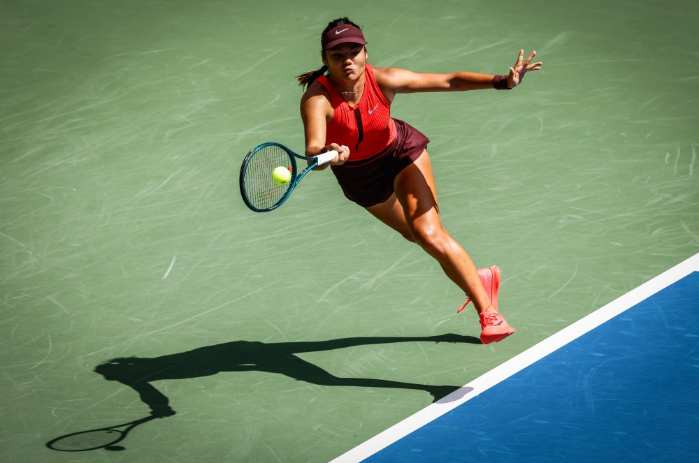 Great Britain's Emma Raducanu plays a forehand return to Japan's Ena Shibahara during their women's singles first round tennis match on day one of the US Open tennis tournament at the USTA Billie Jean King National Tennis Center in New York City, on August 24, 2025. (Photo by Kena Betancur / AFP)
