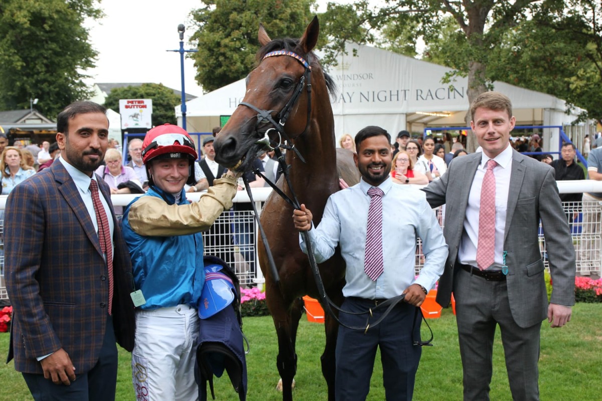 The connections of Wathnan Racing’s Silawi celebrate alongside the victorious five-year-old gelding after his commanding win yesterday.