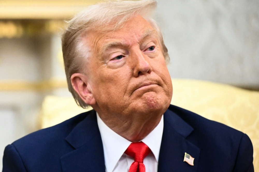 US President Donald Trump in the Oval Office of the White House in Washington, DC, on August 25, 2025. (Photo by Mandel Ngan / AFP)
