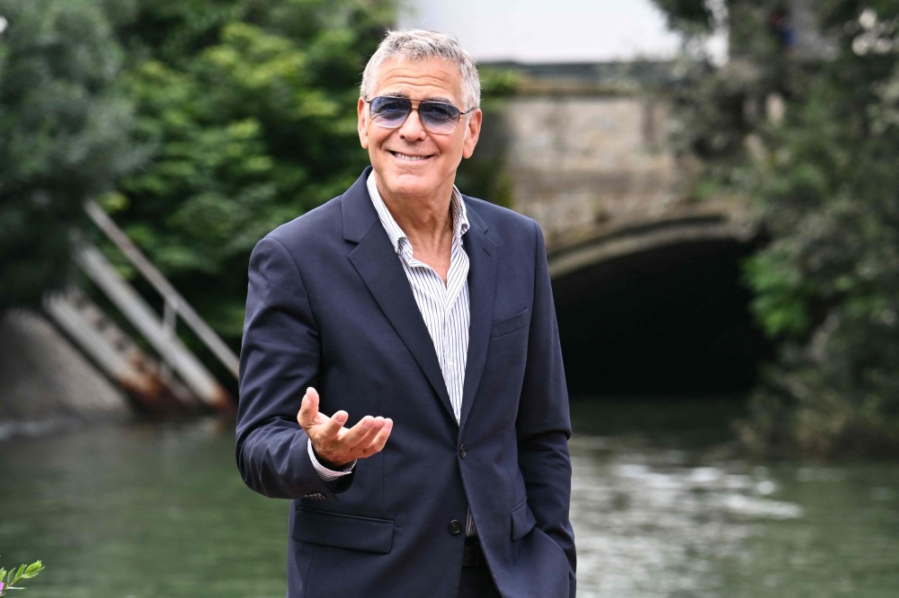 US actor George Clooney arrives at the Excelsior pier during the 82nd Venice International Film Festival at Venice Lido, on August 27, 2025. (Photo by Stefano Rellandini / AFP)
