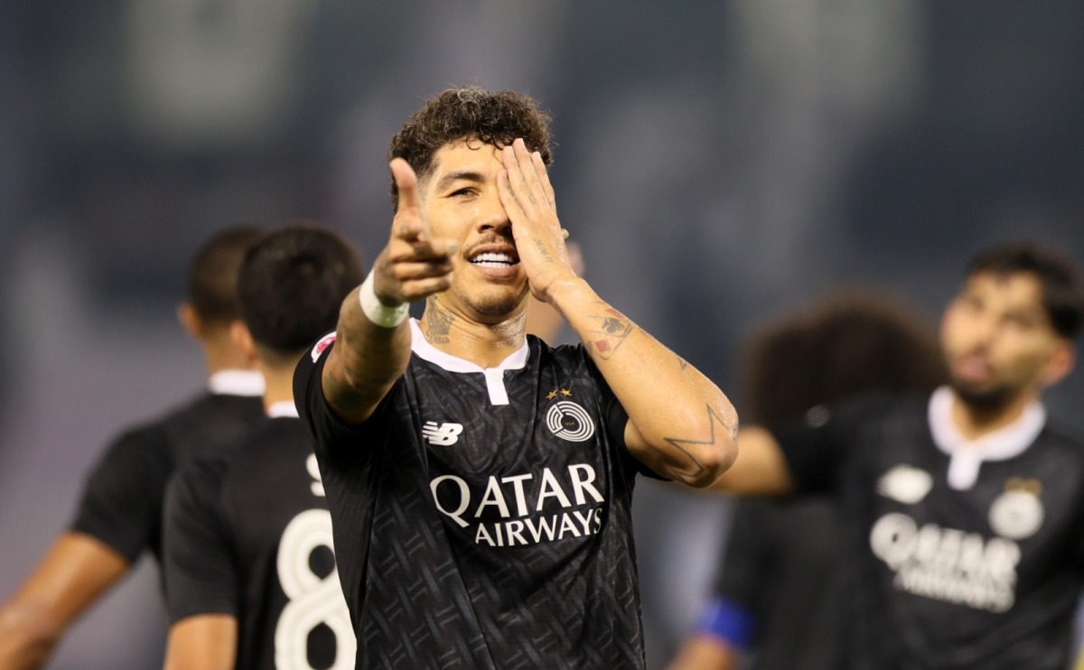 Al Sadd's Roberto Firmino celebrates after scoring a goal against Al Gharafa yesterday.