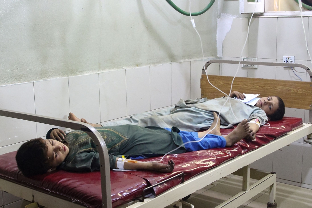 Afghan injured children receive treatment at a hospital after an earthquake in Afghanistan's Jalalabad on September 1, 2025. (Photo by Aimal Zahir / AFP)