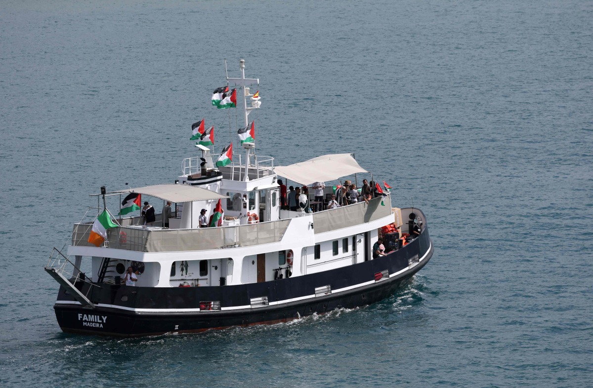 A boat carrying Swedish climate activist Greta Thunberg and activists, part of a civilian flotilla aiming at breaking the Israeli blockade of the Gaza Strip, leaves the port of Barcelona, on August 31, 2025. Photo by Lluis GENE / AFP