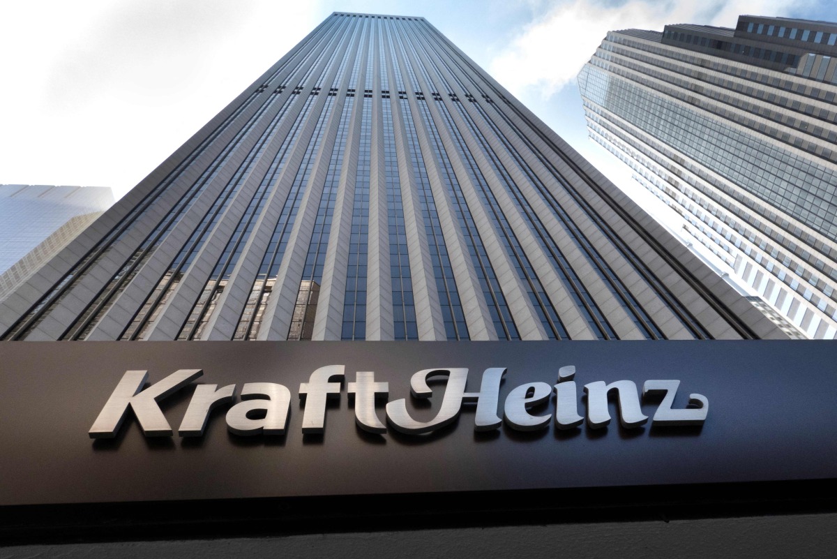 This general view shows the Kraft Heinz logo on The Aon Centre at the company's headquarters in Chicago, Illinois on May 14, 2025. Photo by SCOTT OLSON / GETTY IMAGES NORTH AMERICA / AFP