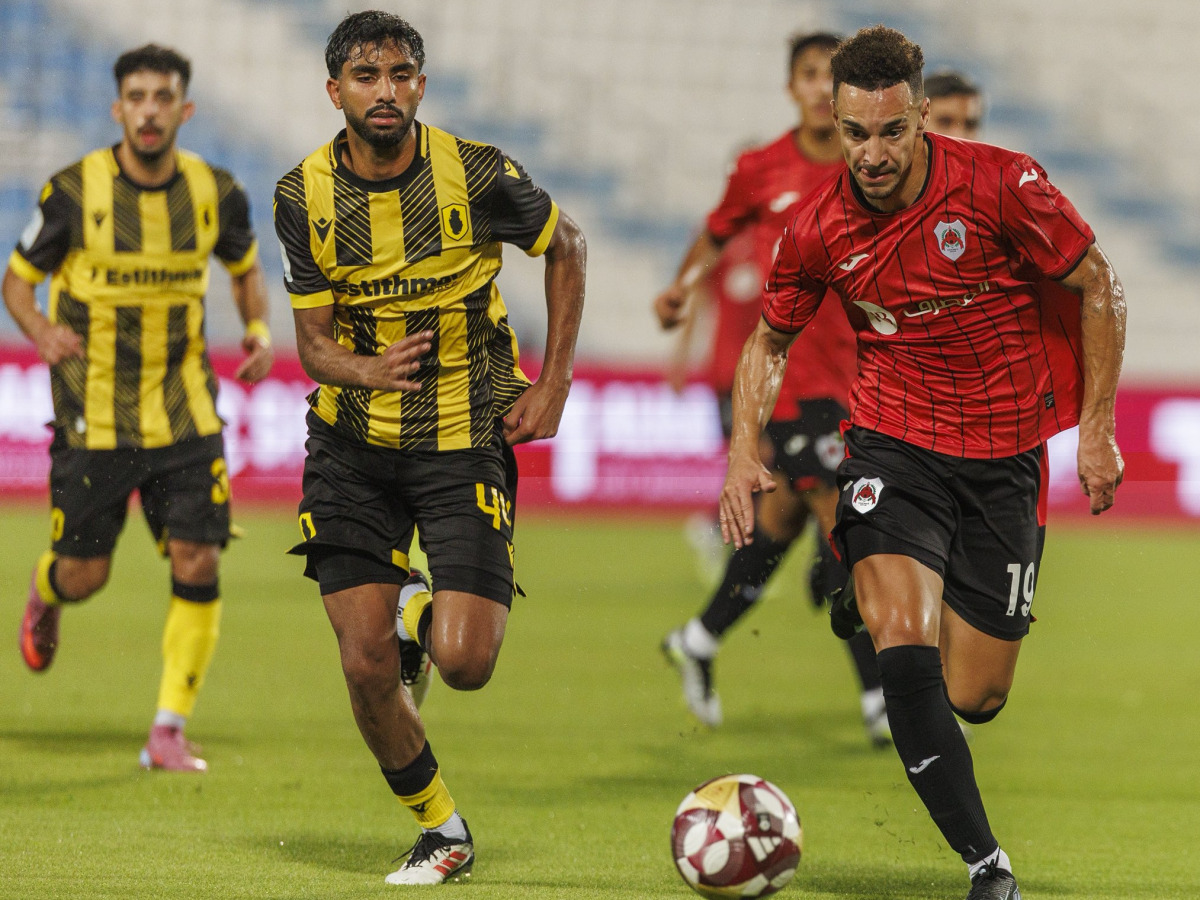 Rodrigo (right) in action during the QSL Cup match against Qatar SC at Saoud Bin Abdulrahman Stadium yesterday.