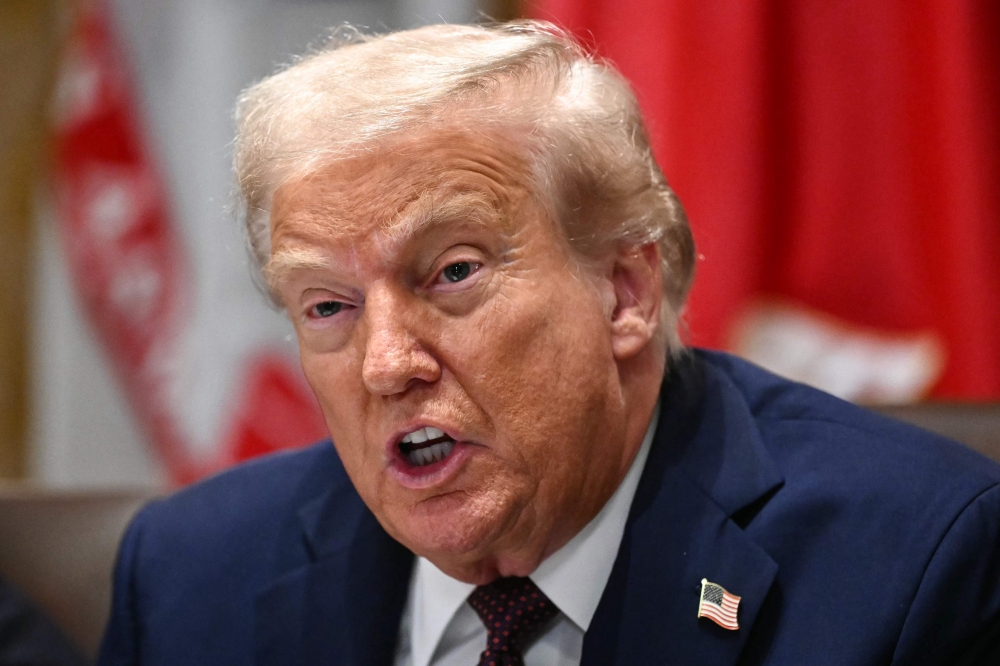 US President Donald Trump speaks during a cabinet meeting in the Cabinet Room of the White House in Washington, DC on August 26, 2025. (Photo by Mandel Ngan / AFP)