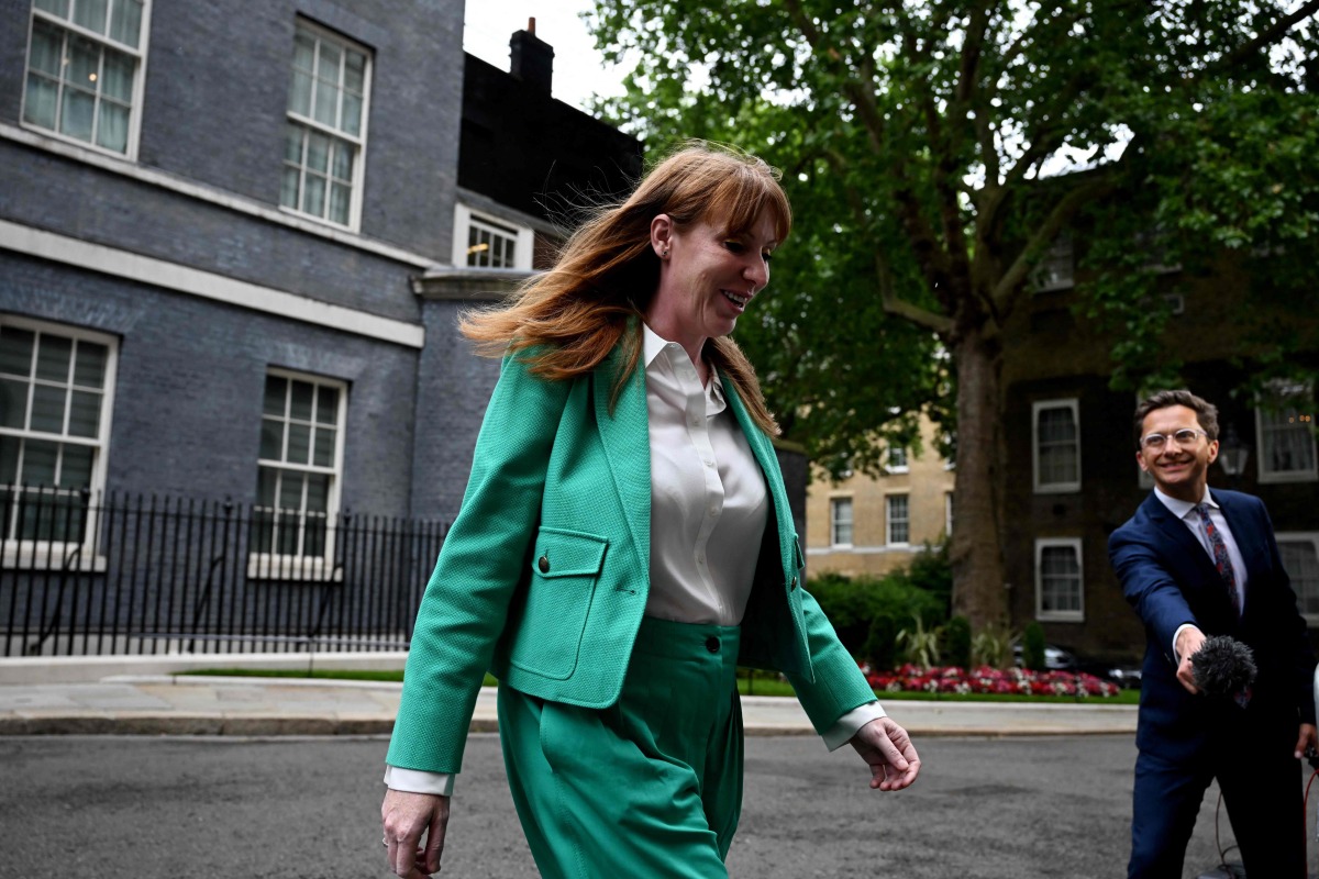 Labour Party deputy leader Angela Rayner leaves 10 Downing Street after being named Britain's deputy prime minister in London on July 5, 2024, a day after Britain held a general election. Photo by Paul ELLIS / AFP