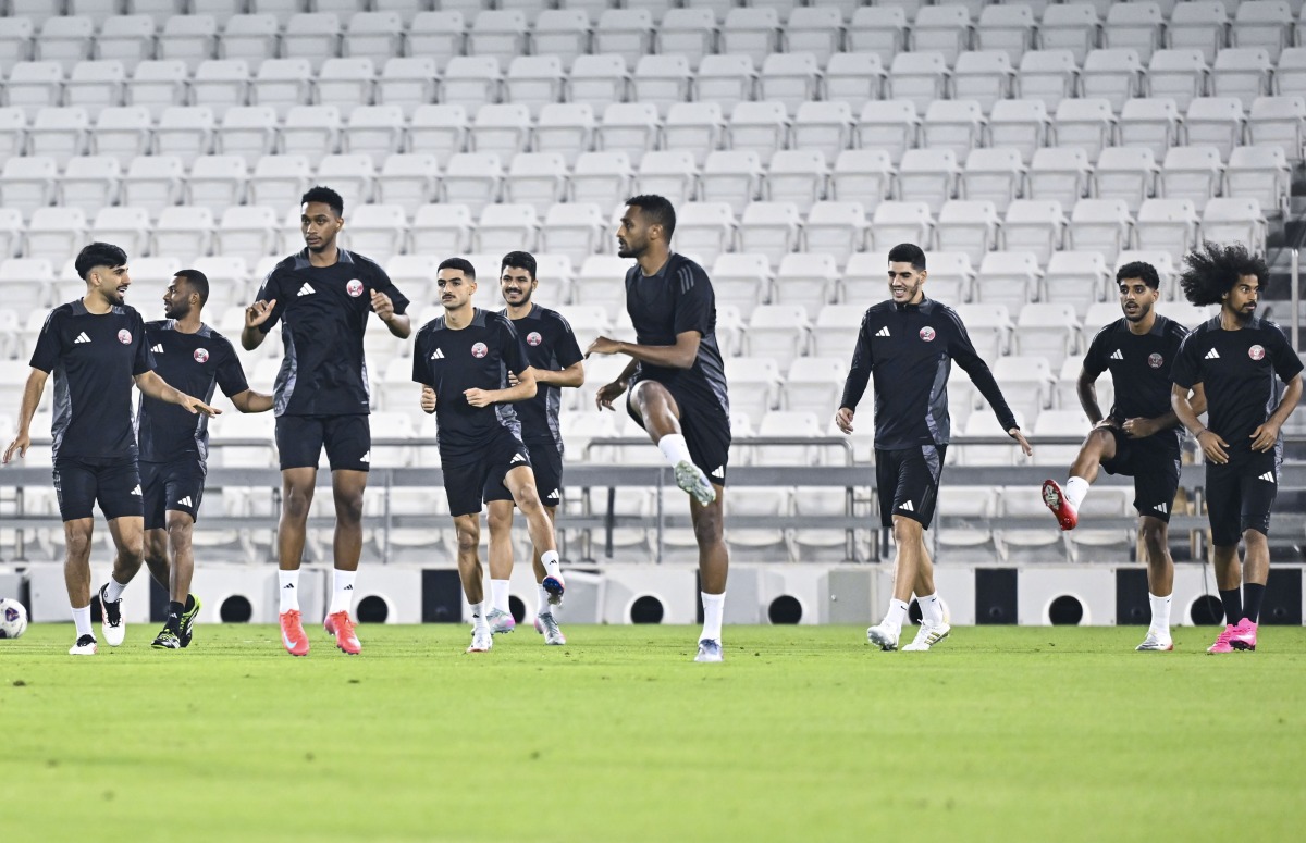 Qatar players take part in a training session yesterday.
