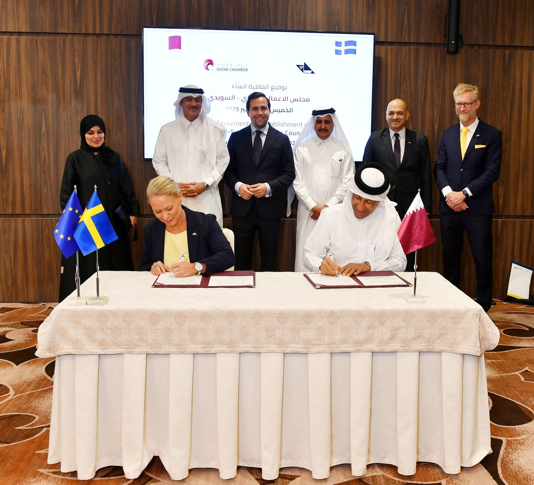 Minister of State for Foreign Trade Affairs at MoCI, H E Dr. Ahmed bin Mohamed Al-Sayed; Minister of International Development Cooperation and Foreign Trade of Sweden, H E Benjamin Dousa; Chairman of QC Sheikh Khalifa bin Jassim bin Mohamed Al Thani with other officials during the agreement signing.